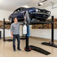 4-Post Car Lift Built for Professional Storage, 8000 Lb Capacity, Drip Trays, Rolling Casters — Lifestyle